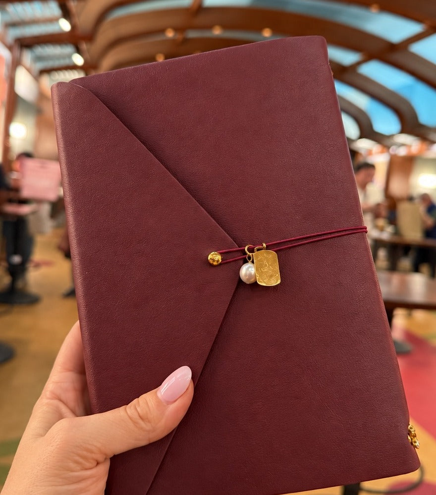 Burgundy leather notebook cover · cover
