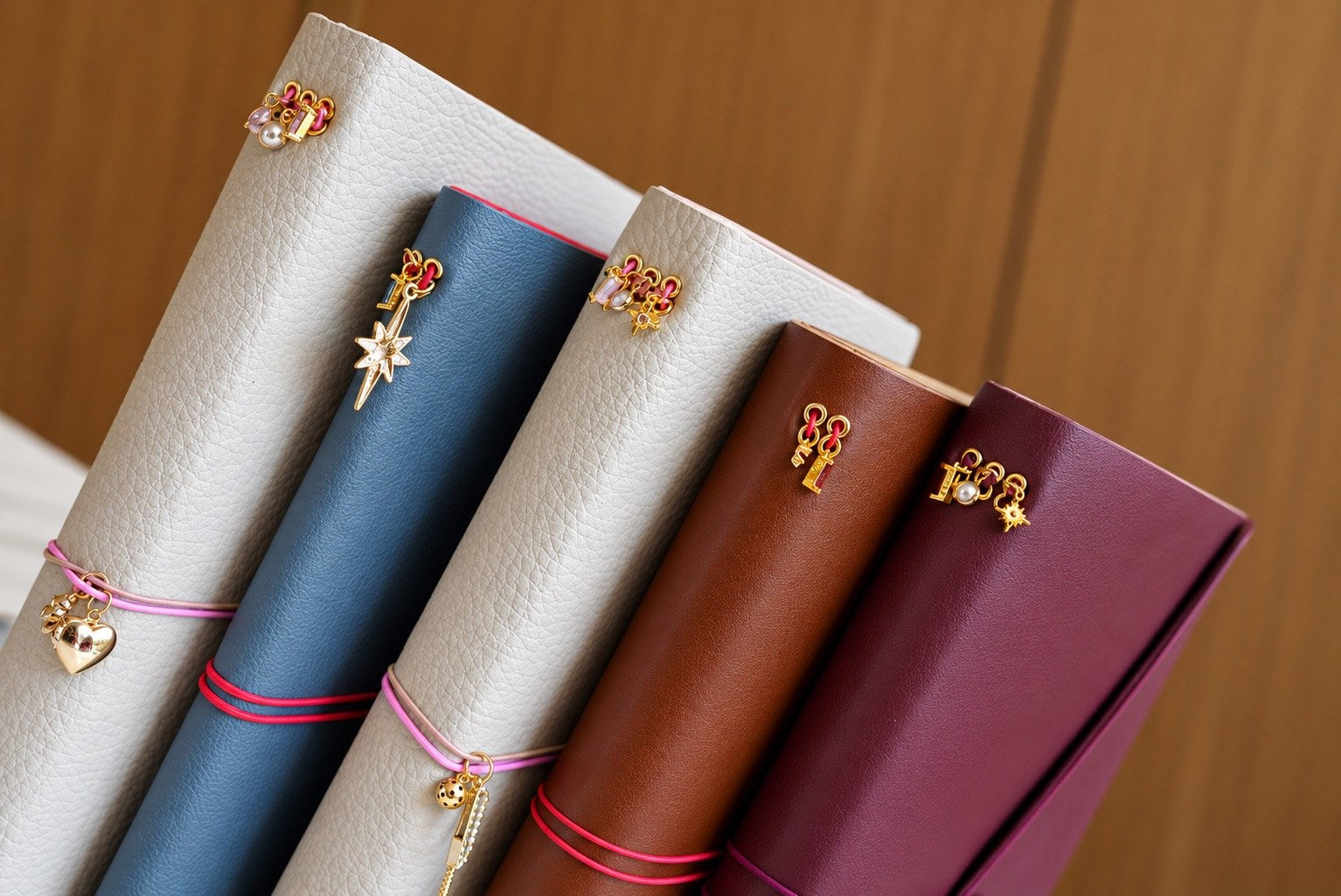 A view of leather wraps and decorative spine hardware