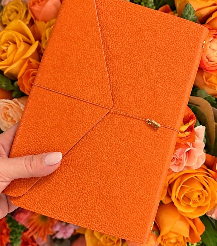 Orange leather notebook cover · cover