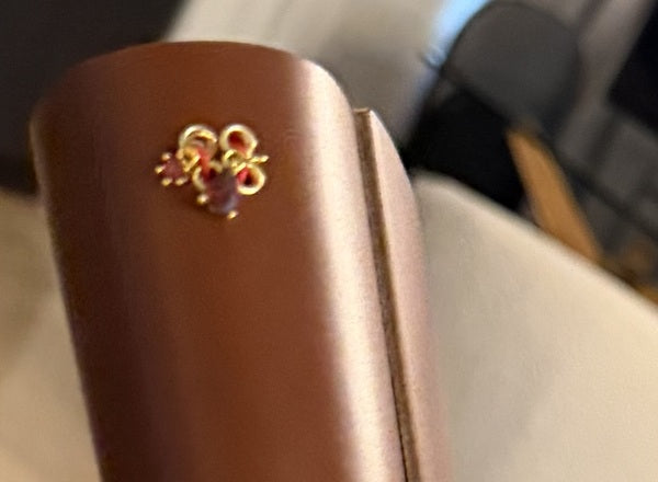 The binding attachment along the notebook spine