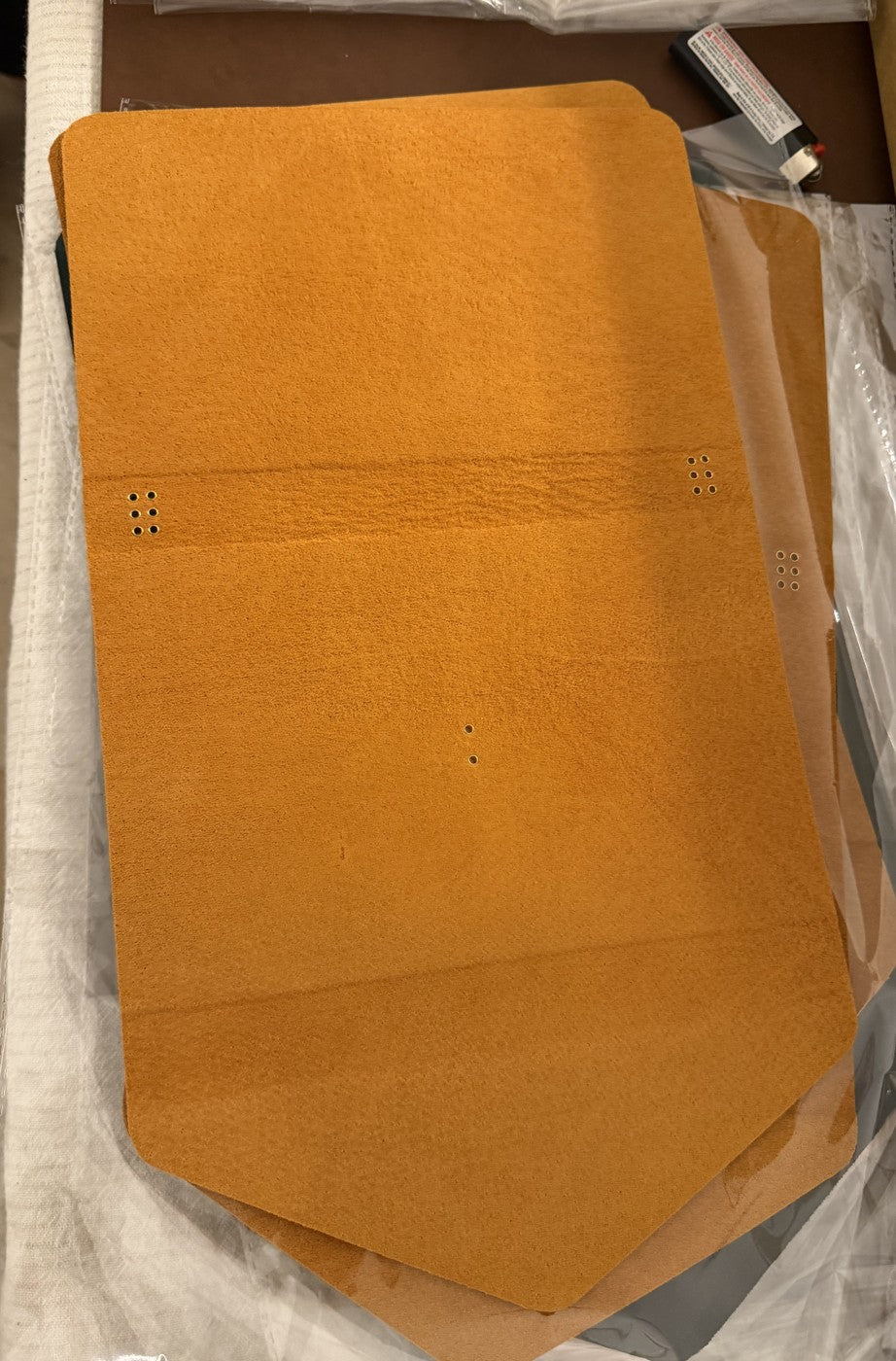 Tobacco interior leather, laid flat before assembly